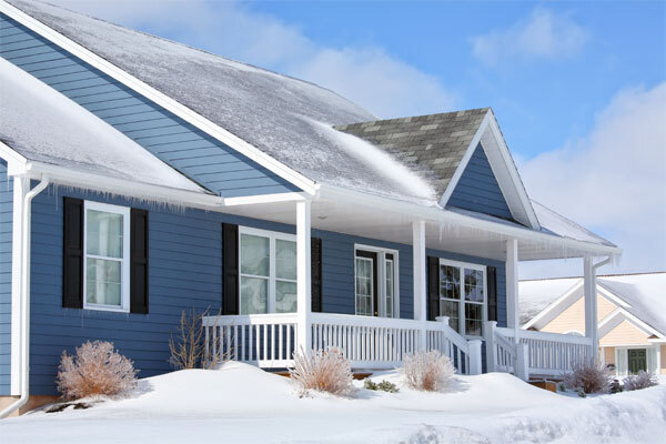 Photo of a house after a snowfall